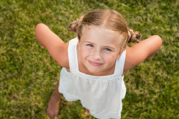 Outdoor portrait of lovely little girl