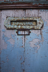 An old letterbox on an abandoned house in Tours