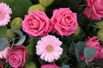 pink roses and gerberas in flower arrangement