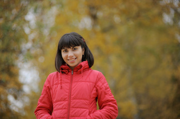 Portrait of a smiling girl in a park