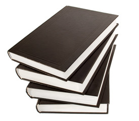 black pile of books on white background