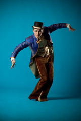 Portrait of the actor on a blue background.