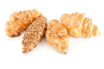 Fresh and tasty croissant over white background