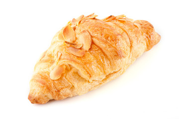 Fresh and tasty croissant over white background