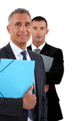 Older and younger businessmen