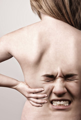 Woman with back pains