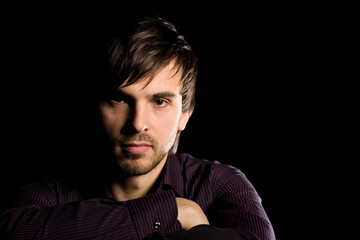 Obraz premium Young man with a serious look