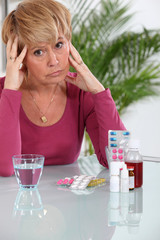 Older woman concerned about her pills