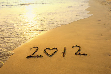 number 2012 on the beach of sunrise