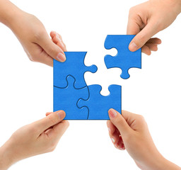 Hands and puzzle