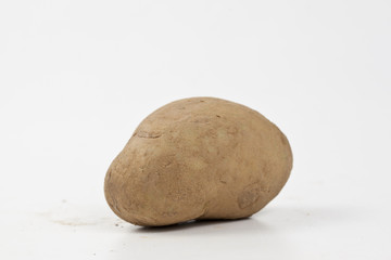 Fototapeta na wymiar Raw potatoes in burlap bag isolated