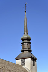Obraz premium Spire of church of La Forclaz in France