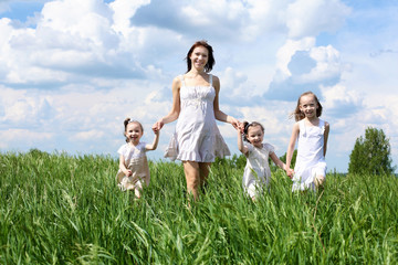 family with children in summer day outdoors