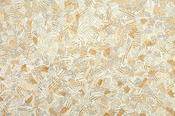 stuck together pieces of paper with text