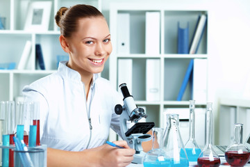 Fototapeta premium Young scientist working in laboratory