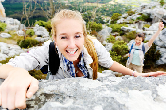 climbing rock woman