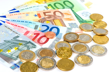 euro coins and banknotes on white