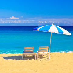 Vhair and umbrella in the beautiful cuban beach of Varadero