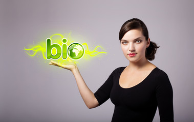 woman holding virtual eco sign