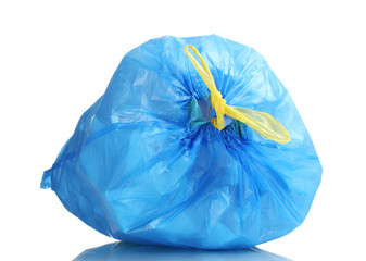 blue garbage bag with trash isolated on white
