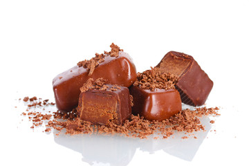 Сhocolate candy covered with chocolate shavings isolated