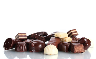 Many different chocolate candy isolated on white
