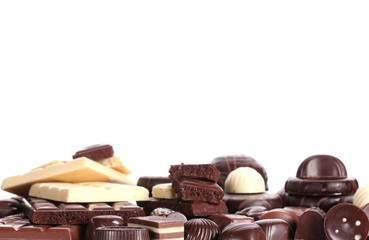 Many different chocolate candy isolated on white
