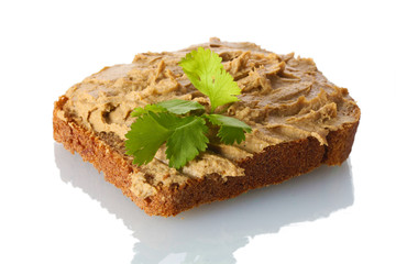 Fresh pate on bread isolated on white