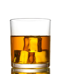 glass of whiskey and ice isolated on white