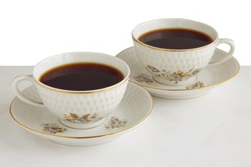 two cups of hot black coffee