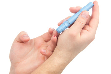 Diabetes lancet in hand prick finger