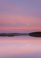 Moon rising over swedish lake