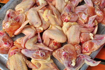 raw chicken wing in the market