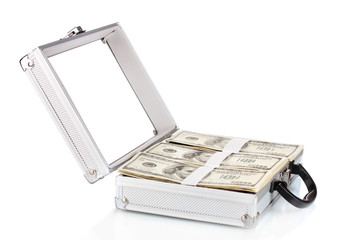 A lot of one hundred dollar bills in a case isolated on white