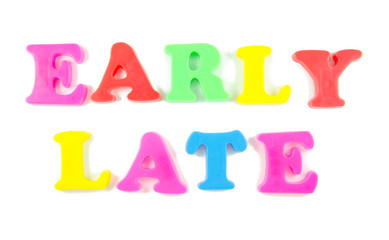 early and late written in fridge magnets