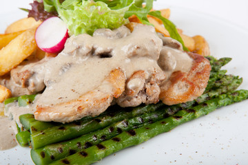 Fried meat with asparagus