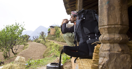 nepali guide resting after trekking annapurna