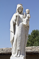 Fototapeta premium old cemetery sculpture of the Virgin