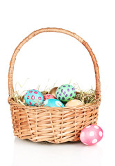 Colorful Easter eggs in the basket  isolated on white