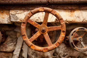 The old rusty metal valve