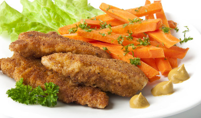 chicken fried in breadcrumbs with vegetables