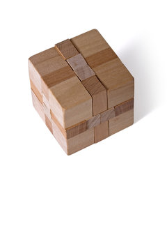 Wooden cube puzzle, white background. Clipping path included.