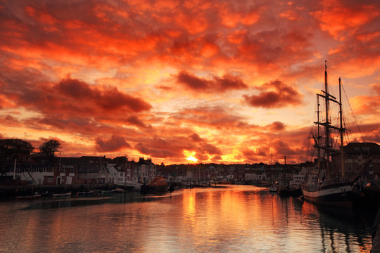 Weymouth harbour, Dorset England, sunset, ship