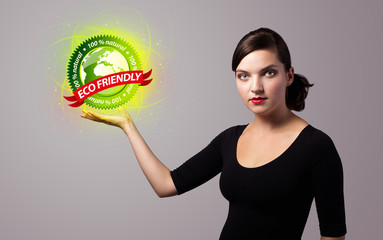 woman holding virtual eco sign