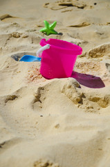 children toy on sea sand