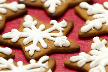 Fototapeta na wymiar Gingerbread Cookies with White Snowflake Icing