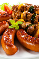 Grilled meat, sausages and vegetables
