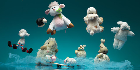 funny group toy sheeps playing different games