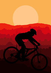 Obraz premium Mountain bike rider in wild nature landscape background