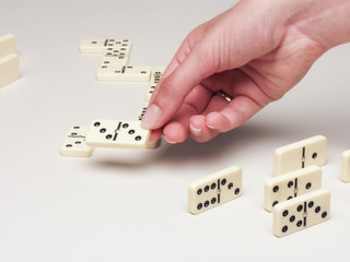 hand with domino